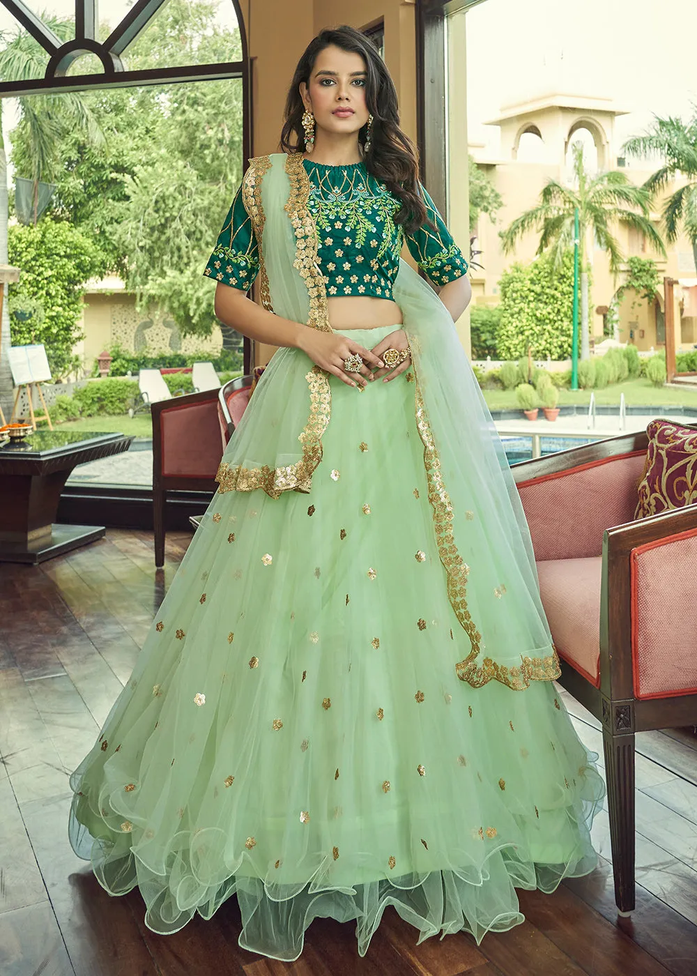 Glamorous Pista Green Heavy Net Party Wear Lehenga Choli